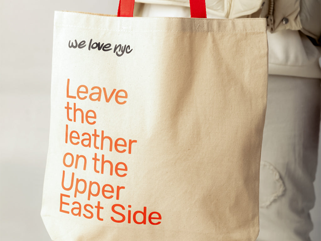 "LEAVE THE LEATHER ON THE UPPER EAST SIDE" TOTE BAG